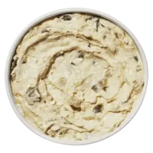 Side Crazy Feta from Cava menu – creamy feta cheese mixed with spicy, tangy seasoning for a bold Mediterranean dip.