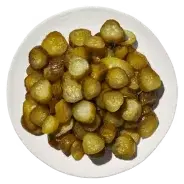 Salt Brined Pickles from Cava menu – crisp and tangy pickles made with a salty brine for a perfect Mediterranean crunch.