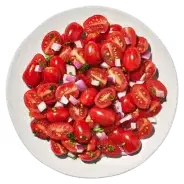 Tomato Onion from Cava menu – fresh, vibrant tomatoes and onions tossed together with Mediterranean seasonings.