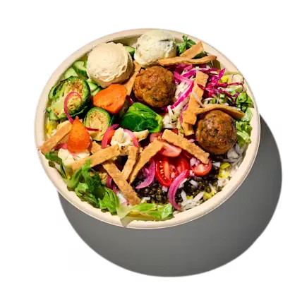 Falafel Crunch Bowl with crispy falafel, fresh vegetables, and a flavorful dressing.